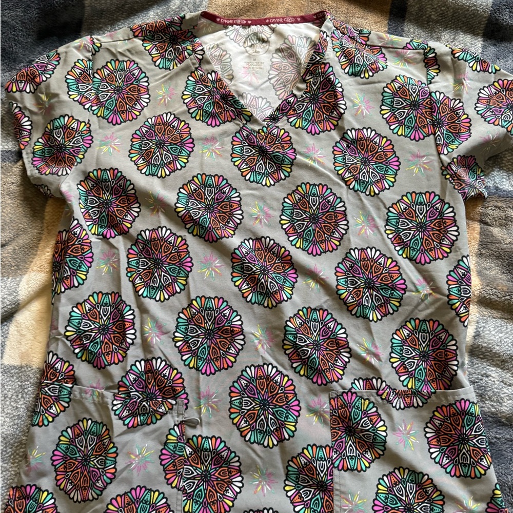 Grey mandala patterned scrub top.
